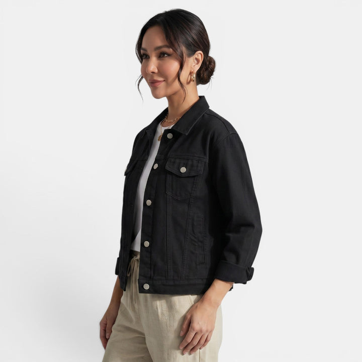 Versatile women's fitted jacket worn open, a perfect layering piece for urban adventures & casual weekend style.
