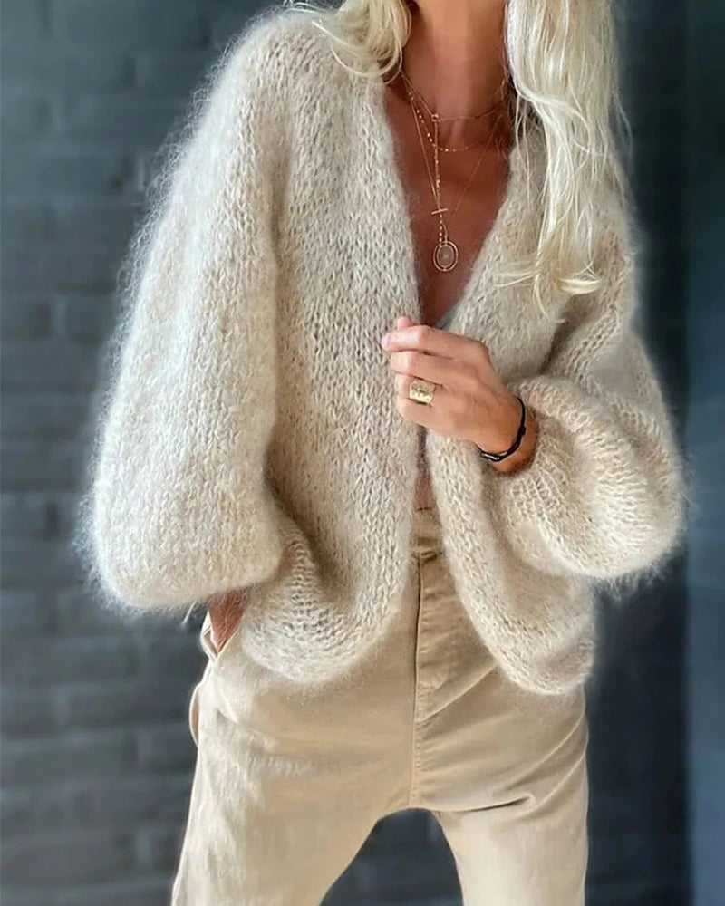Women's casual flared sleeve cardigan in ribbed knit, perfect for effortless everyday layering and chic autumn style.