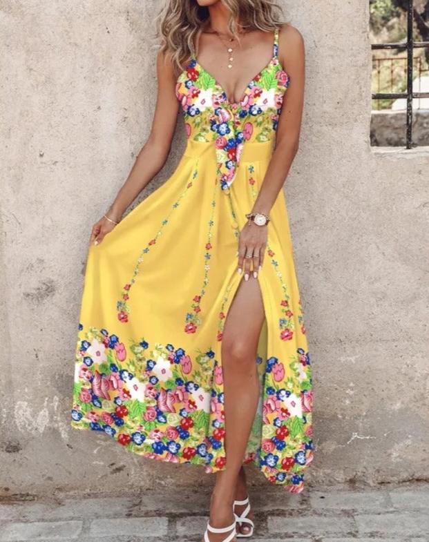 Printed casual women's sleeveless maxi dress with elegant knot detail and flowy fabric.