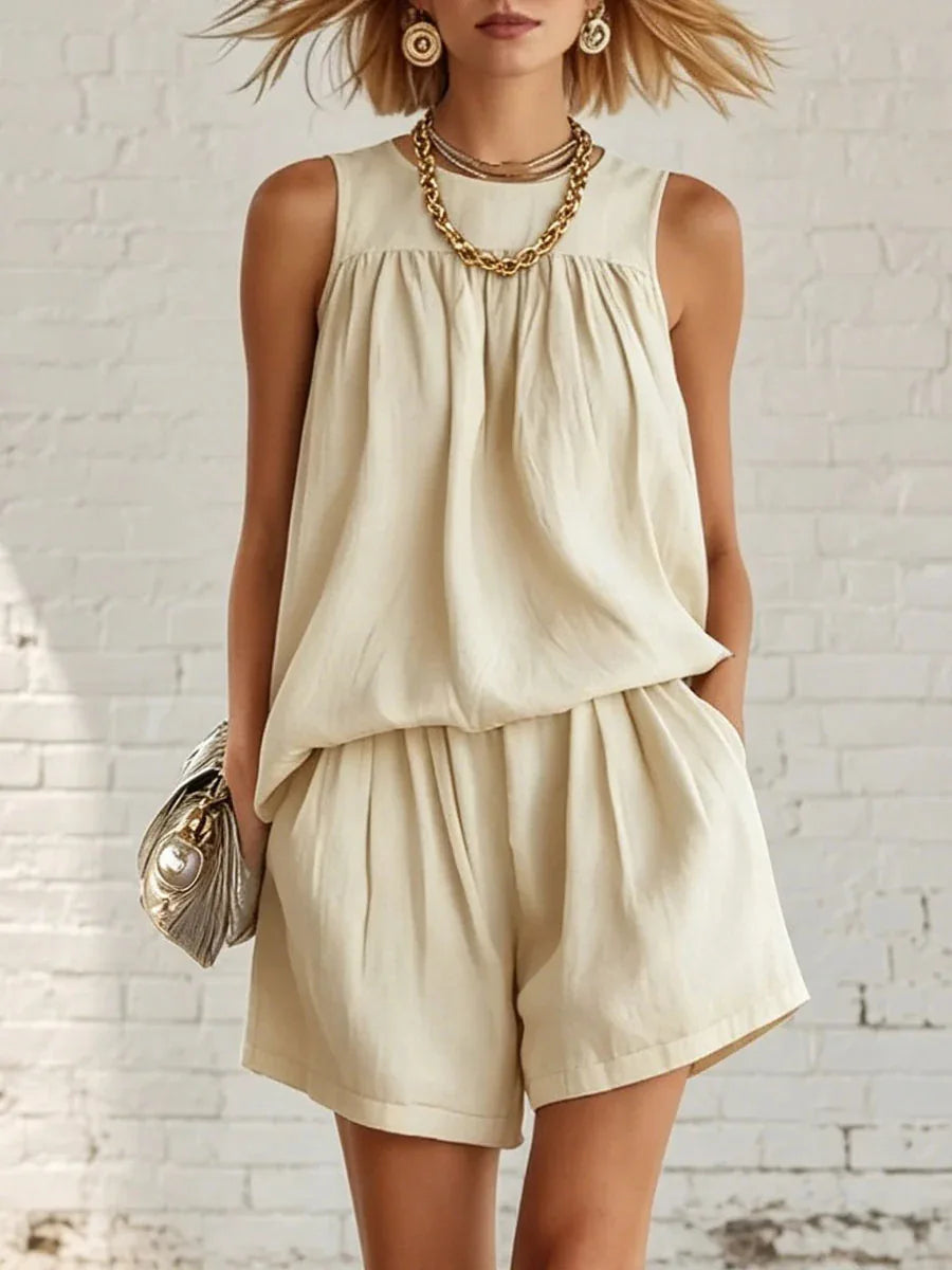 Women's casual gathered top & high-waist shorts two-piece set, perfect for summer vacation or weekend wear.