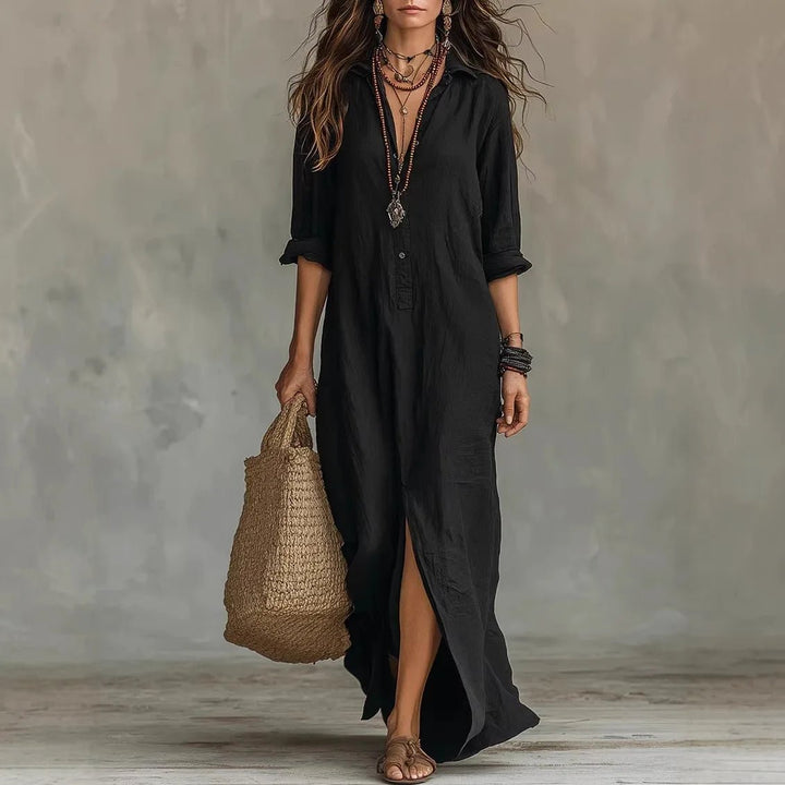 Relaxed fit women's casual maxi dress, featuring a half button front, 3/4 sleeves, & a stylish side split.