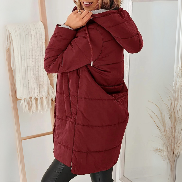 Stylish & warm women's puffer jacket with hood, ideal cozy outerwear for winter & fall.