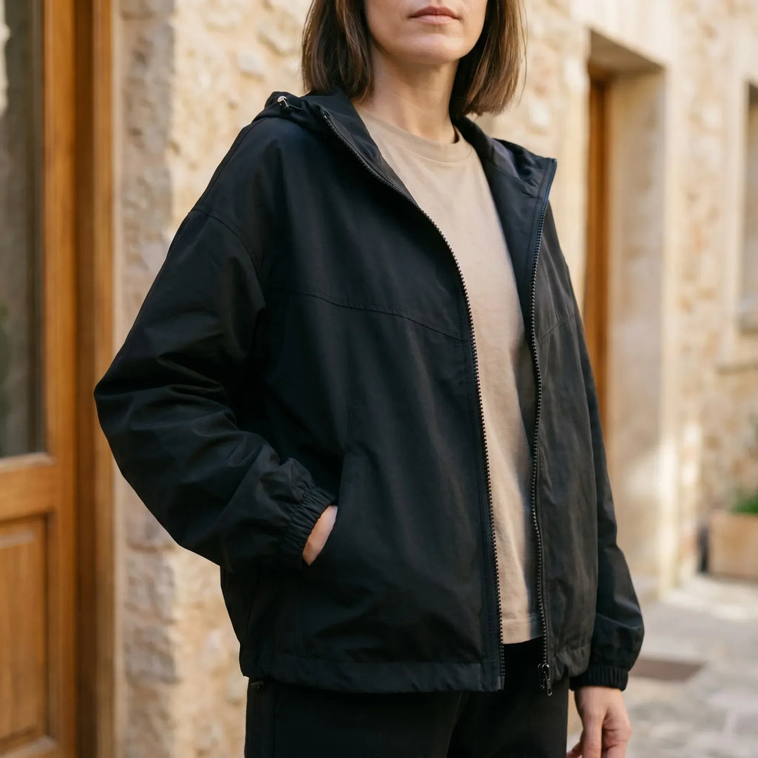Women's casual hooded windbreaker jacket, perfect for transitional weather & everyday wear. Lightweight zipper outerwear.