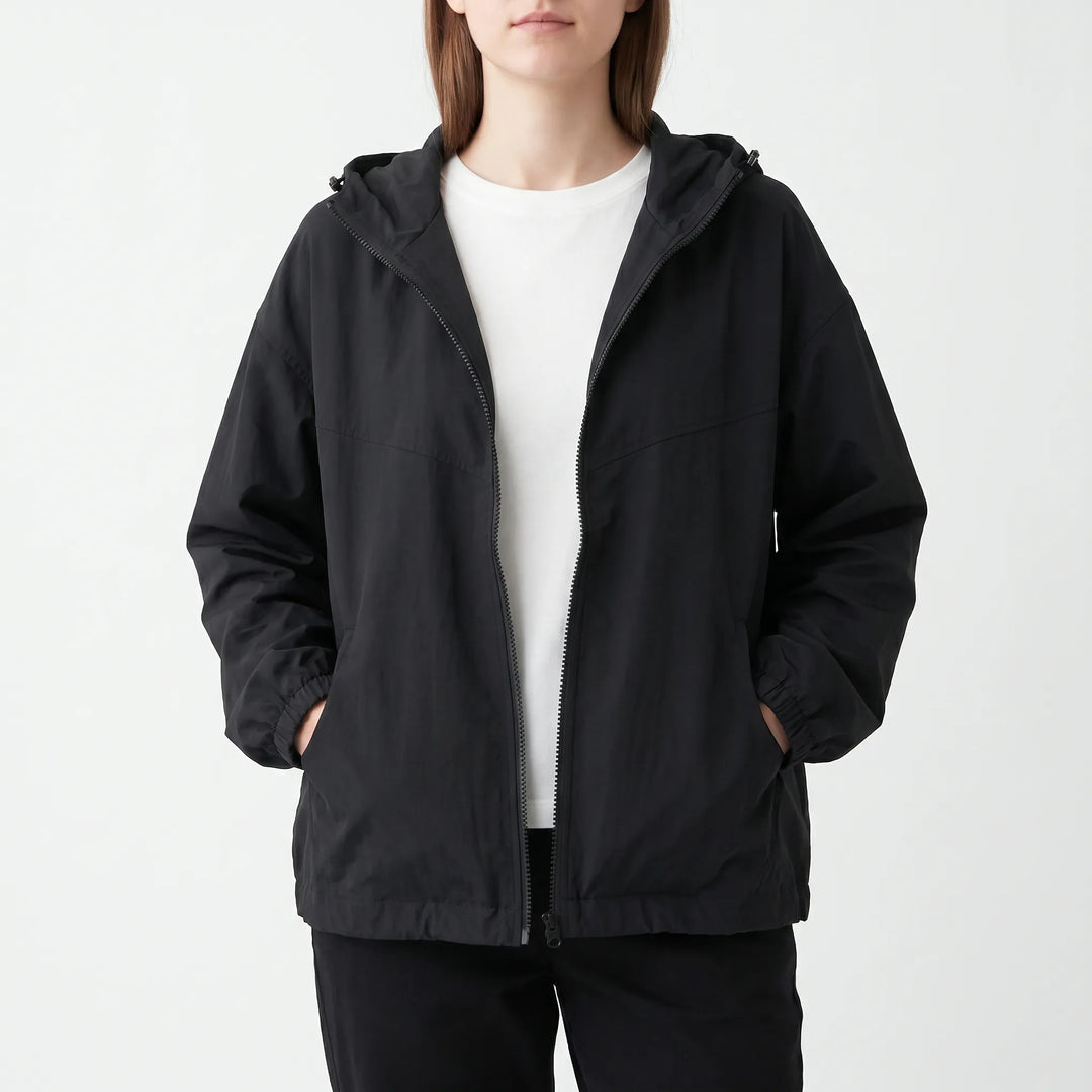 Lightweight women's hooded windbreaker, ideal for activewear & outdoor activities. Casual spring/fall zipper jacket.