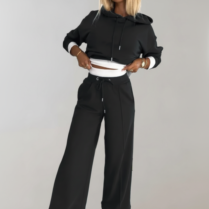 Front view of a women's Mona loungewear set, including a long-sleeve hoodie and flowy wide-leg pants.