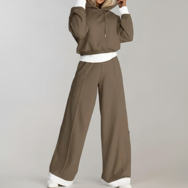 Versatile women's apparel: A hoodie and wide-leg pants set designed for ultimate comfort and casual style.