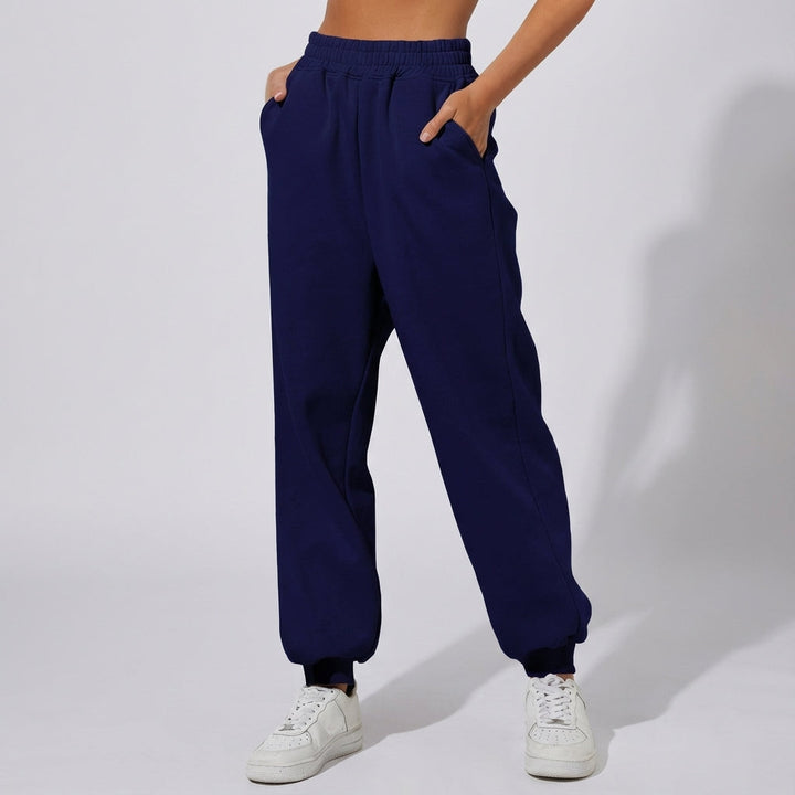 Stack of folded Martha women's joggers in various colors, emphasizing comfort and casual appeal