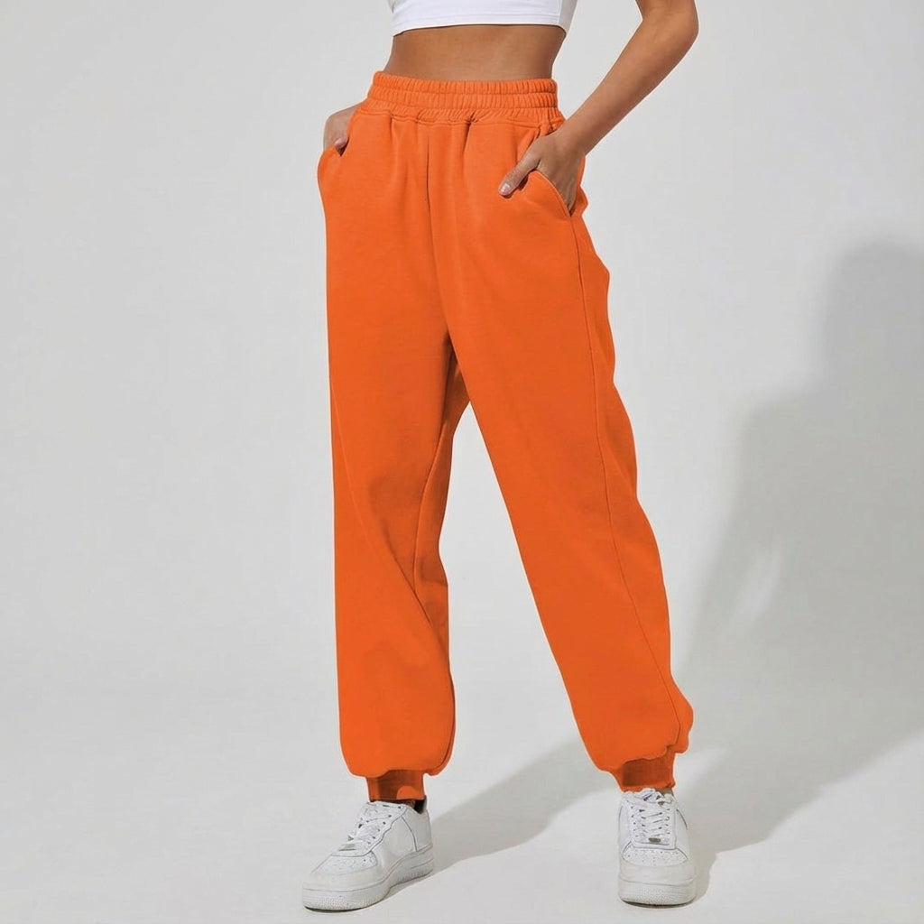 Back view of women's Martha jogger pants, black, highlighting deep pockets for convenience