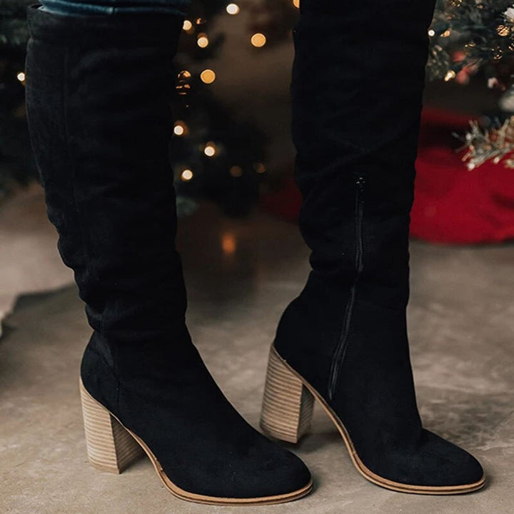 Effortless style with women's casual knee-high zip boots. Comfortable & versatile everyday footwear.