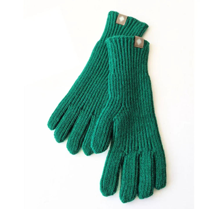 Fashionable women's knitted gloves. Warm, soft, and touchscreen compatible for a chic winter accessory.