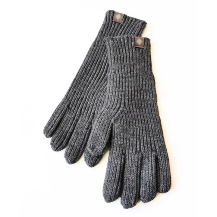 Soft knitted women's gloves with touchscreen fingers. Warm and comfortable casual winter fashion accessory.