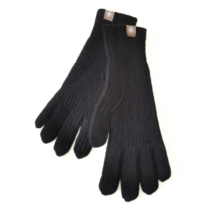 Stylish women's touchscreen knitted gloves. A warm, practical & soft accessory for casual winter fashion.
