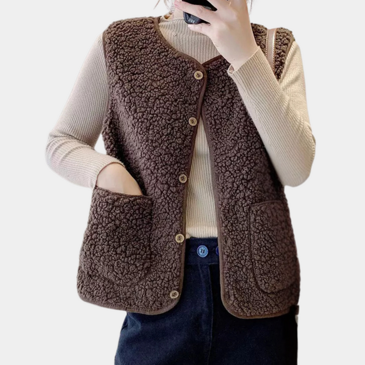 Sleeveless women's vest with knotted front, ideal for casual spring & fall outfits.