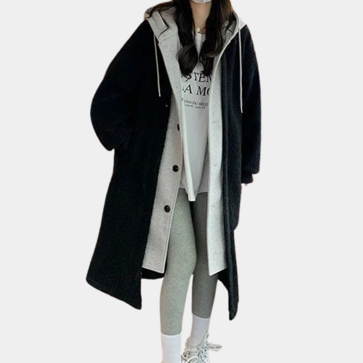 Cozy women's long hooded jacket, ideal casual outerwear for staying warm in winter.