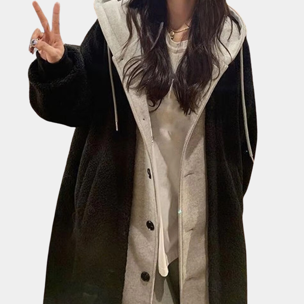 Comfortable women's long hooded jacket, a stylish and warm everyday outerwear choice.