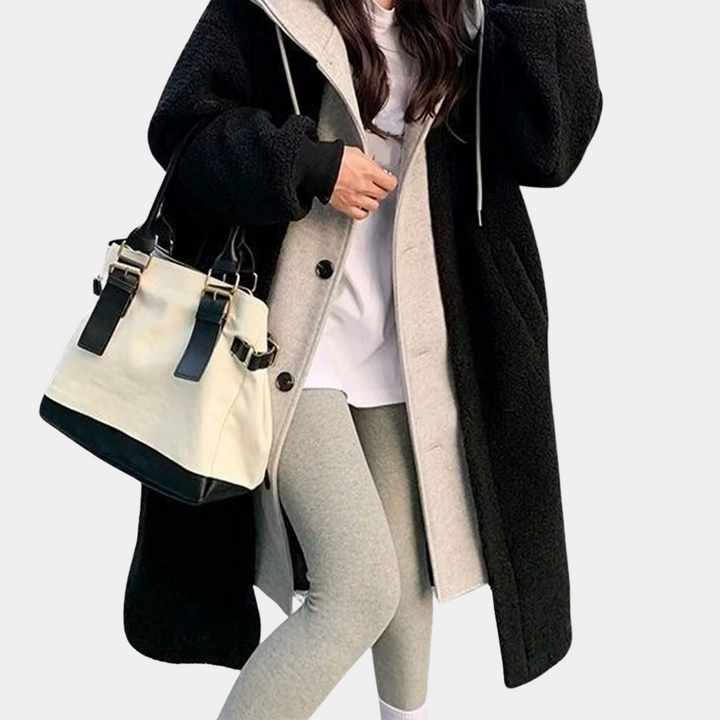 Versatile women's long hooded jacket, perfect as a casual coat for fall and winter seasons.