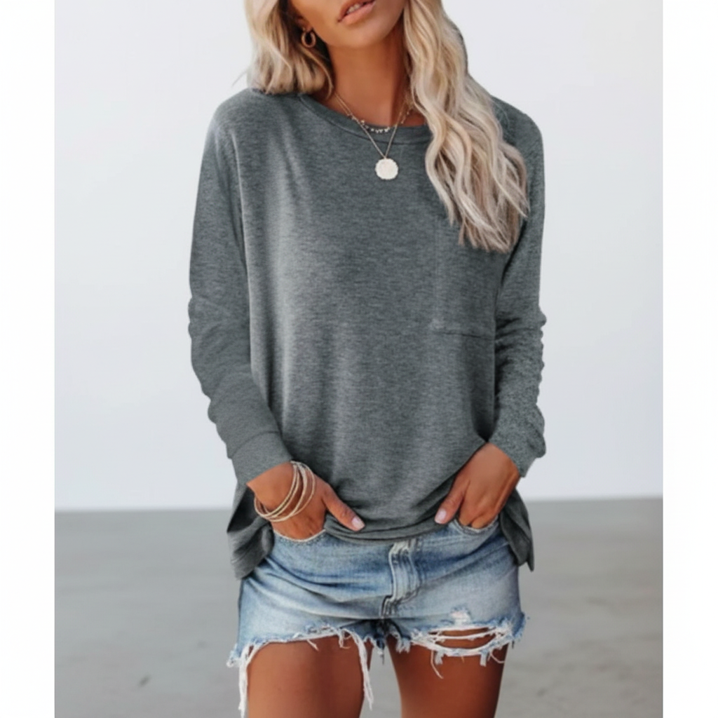 Comfortable women's long sleeve top with a round neck, versatile for autumn fashion.