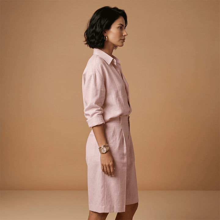 Stylish women's matching set: long sleeve top & pleated shorts for casual outings & travel.