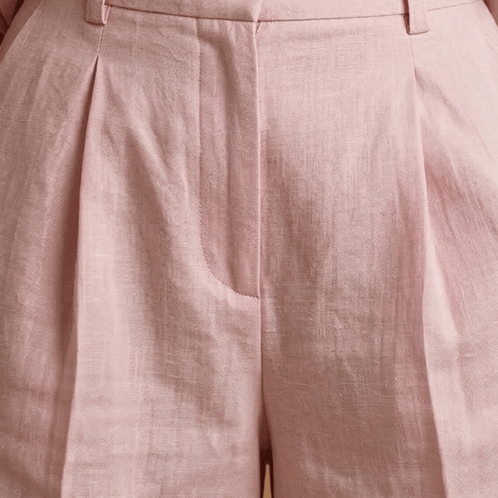 Women's casual two-piece outfit with long sleeve shirt & shorts, great for relaxing or exploring.