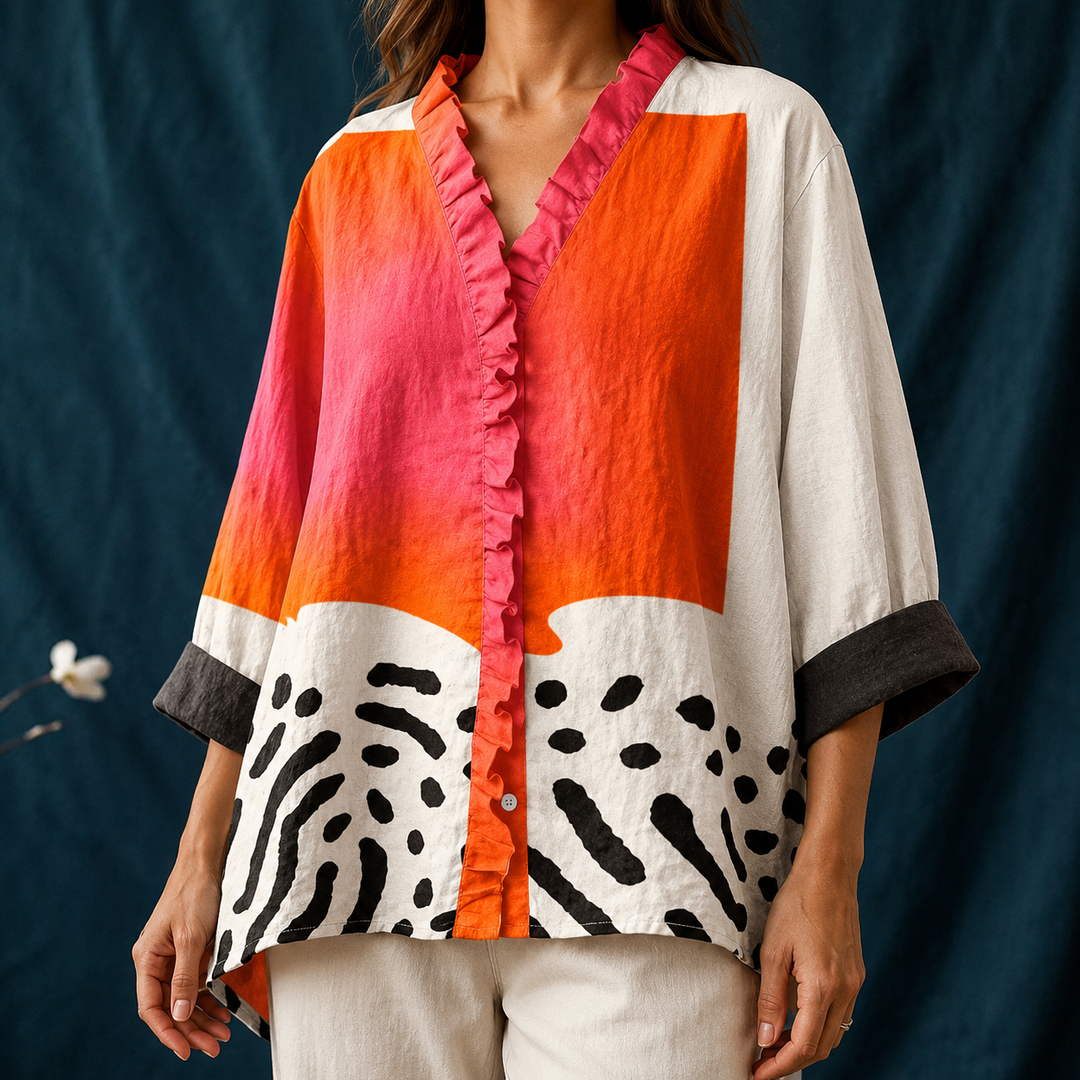Comfortable women's button-up blouse, long sleeve and V-neck with vibrant abstract block pattern. Relaxed daily wear top.