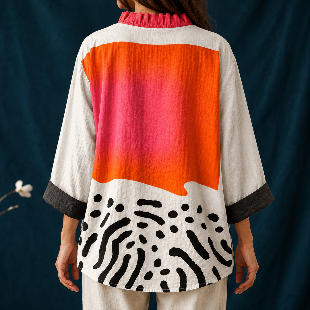 Stylish women's casual blouse, V-neck button-up with unique abstract block pattern. Perfect loose fit top for summer.