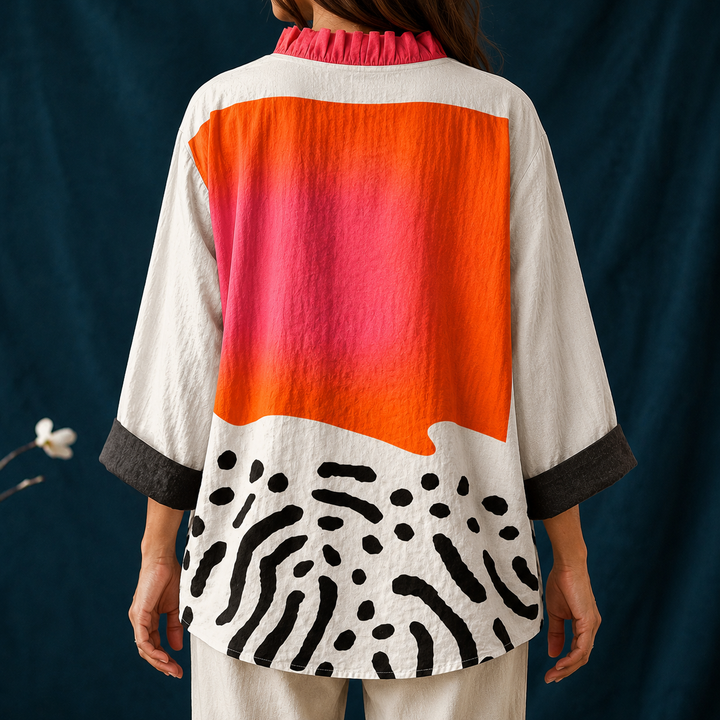 Stylish women's casual blouse, V-neck button-up with unique abstract block pattern. Perfect loose fit top for summer.
