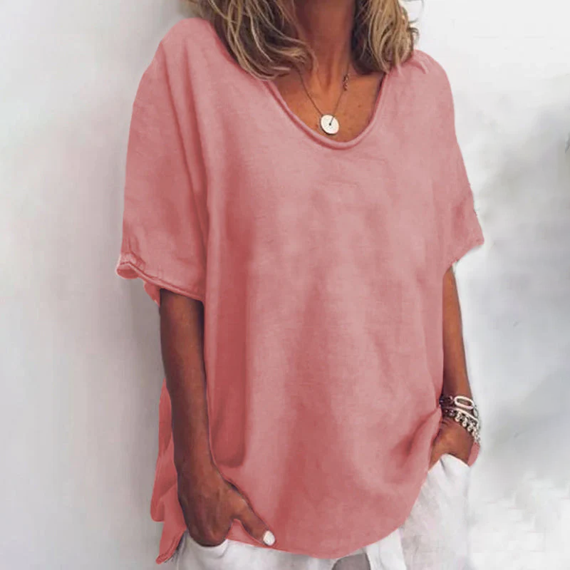 Women's casual loose fit t-shirt, perfect for summer. Comfortable short sleeve top, oversized style for relaxed wear.