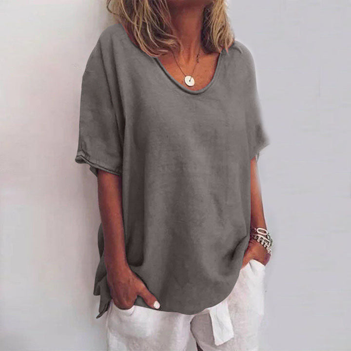 Oversized women's summer t-shirt, loose fit and breathable. Comfortable short sleeve top for ultimate casual style.