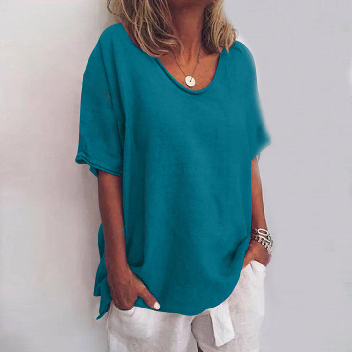 Casual women's summer top, a comfortable loose fit t-shirt. Relaxed short sleeve design, ideal for warm weather days.