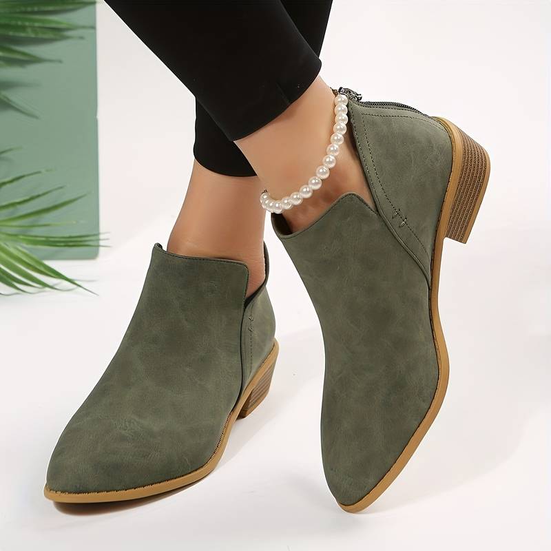 Women's casual low heel slip-on ankle boots with a comfortable block heel for everyday fall & winter style.