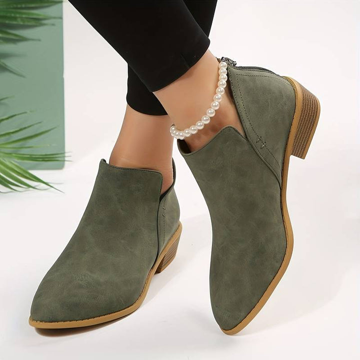 Women's casual low heel slip-on ankle boots with a comfortable block heel for everyday fall & winter style.