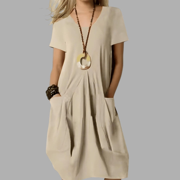 Flattering women's summer midi dress, ideal for casual daytime wear. Effortless comfort & everyday style.