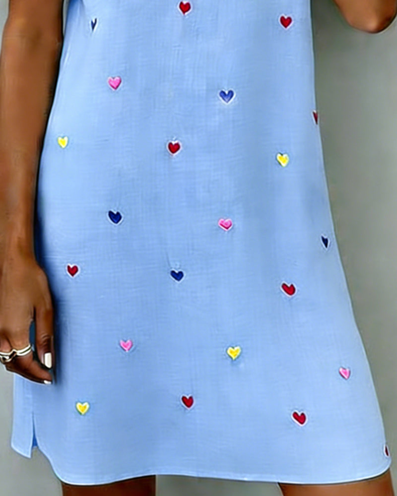 Versatile women's day dress: heart print mini with a V-neck and puff sleeves, perfect for everyday casual wear.