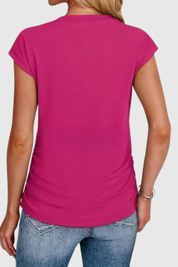 Comfortable women's everyday ruched tunic top, a versatile short sleeve blouse for casual wear.