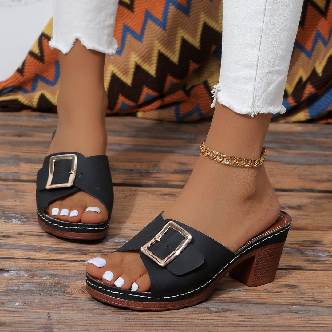 White women's casual sandals, sleek design for comfortable & stylish everyday wear.
