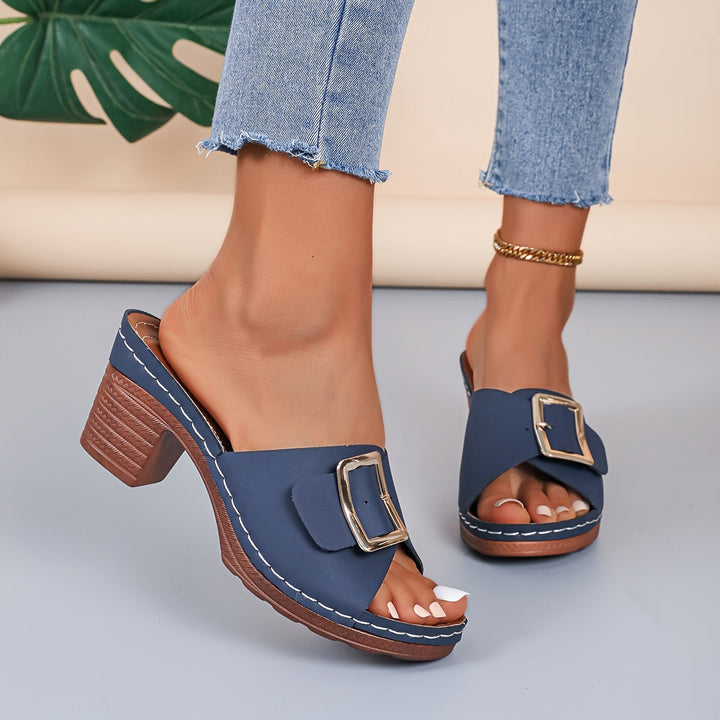 Woman wearing comfortable casual sandals, stylish everyday footwear for summer activities.