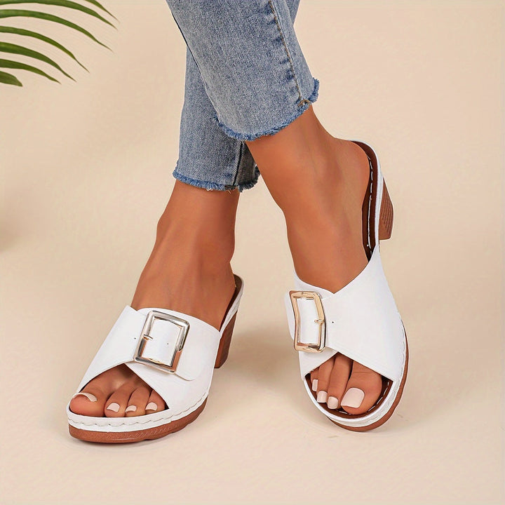 Beige women's flat casual sandals, stylish open-toe design for comfortable everyday wear.
