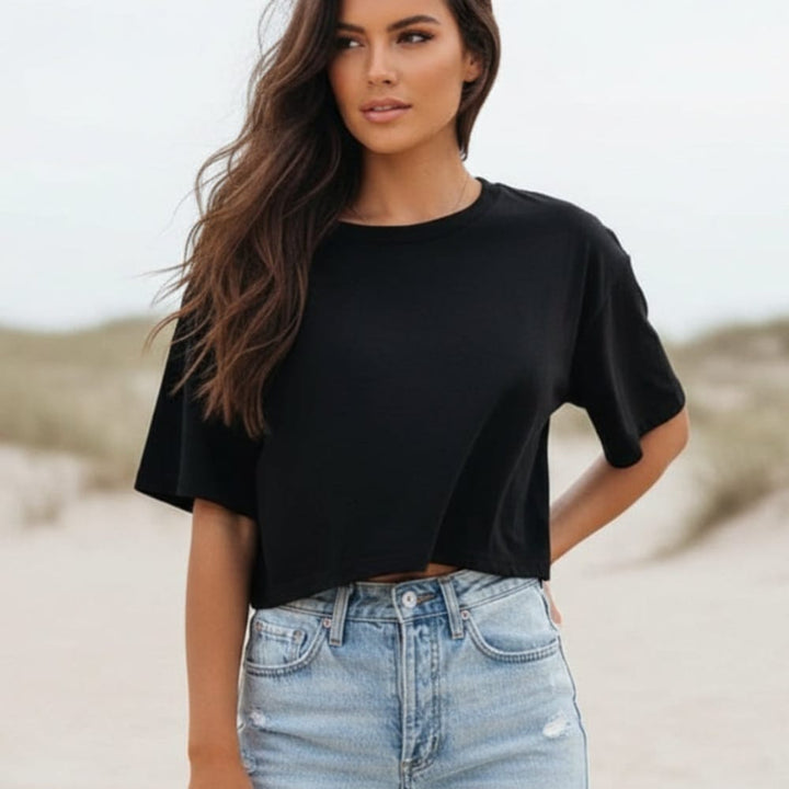 Trendy women's short sleeve crop top t-shirt with a round neck. Ideal casual summer top for everyday comfort.