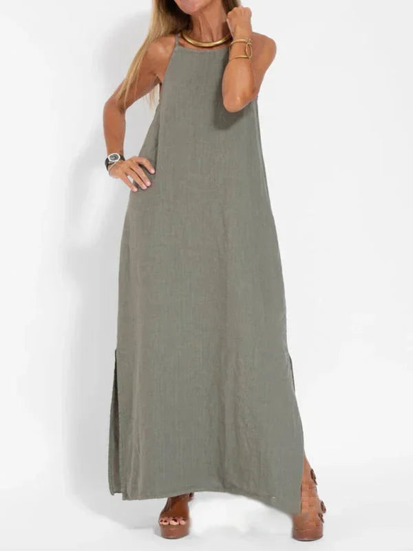 Women's casual sleeveless maxi dress with a stylish side slit, perfect for summer comfort.
