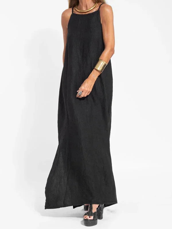 Relaxed fit sleeveless maxi dress for women, with side slit, great for outdoor casual events.