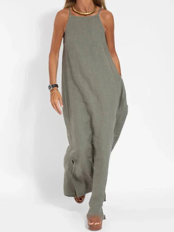 Versatile women's sleeveless long dress with side slit, ideal for everyday casual wear.