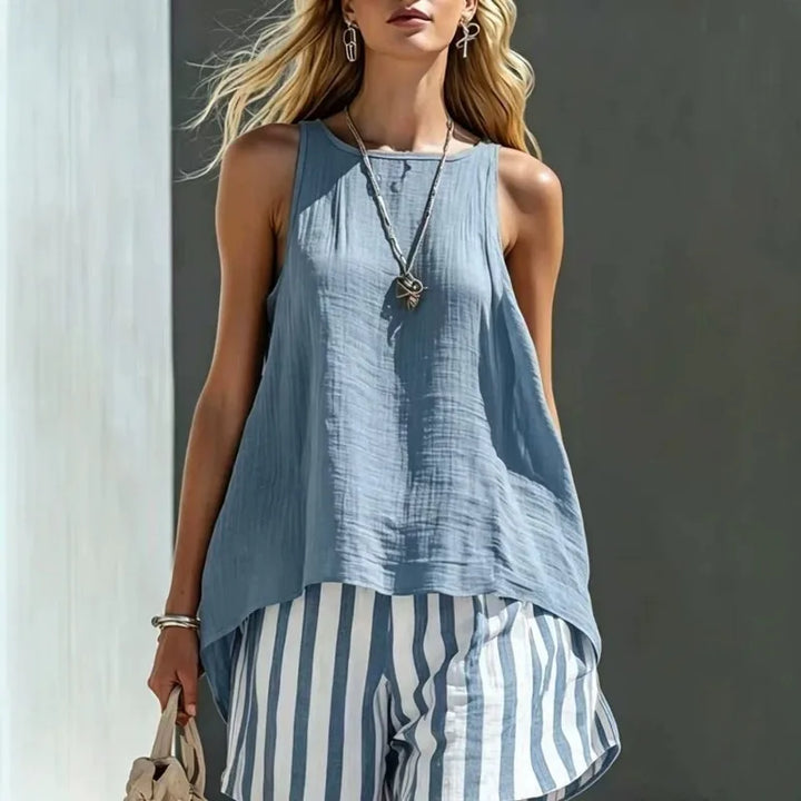Women's casual sleeveless tank & striped shorts set. Perfect for summer, vacation, or beach wear. Relaxed fit comfort.