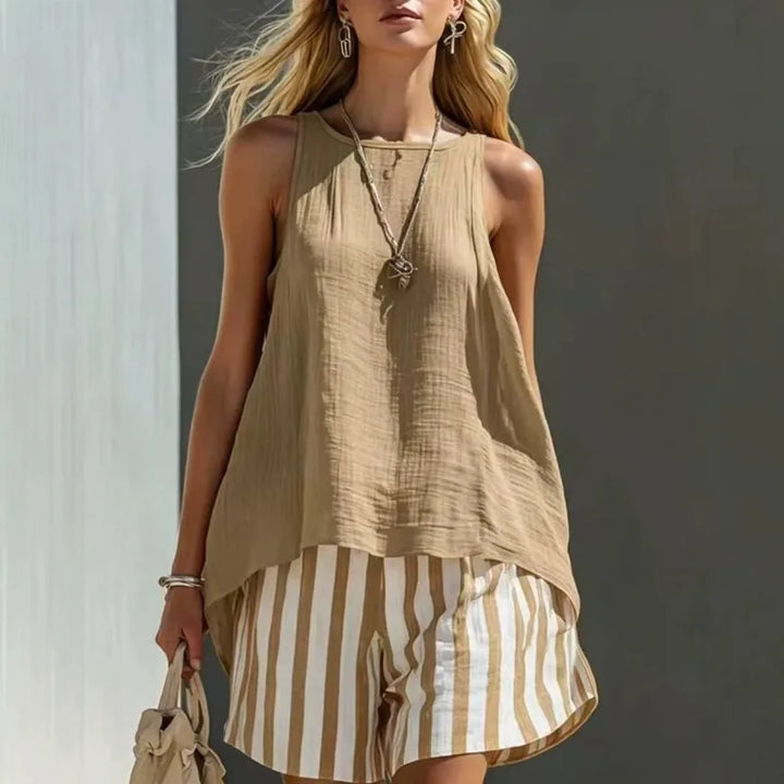 Relaxed fit women's sleeveless tank & striped shorts set for casual summer wear, beach days, or vacation outfits.