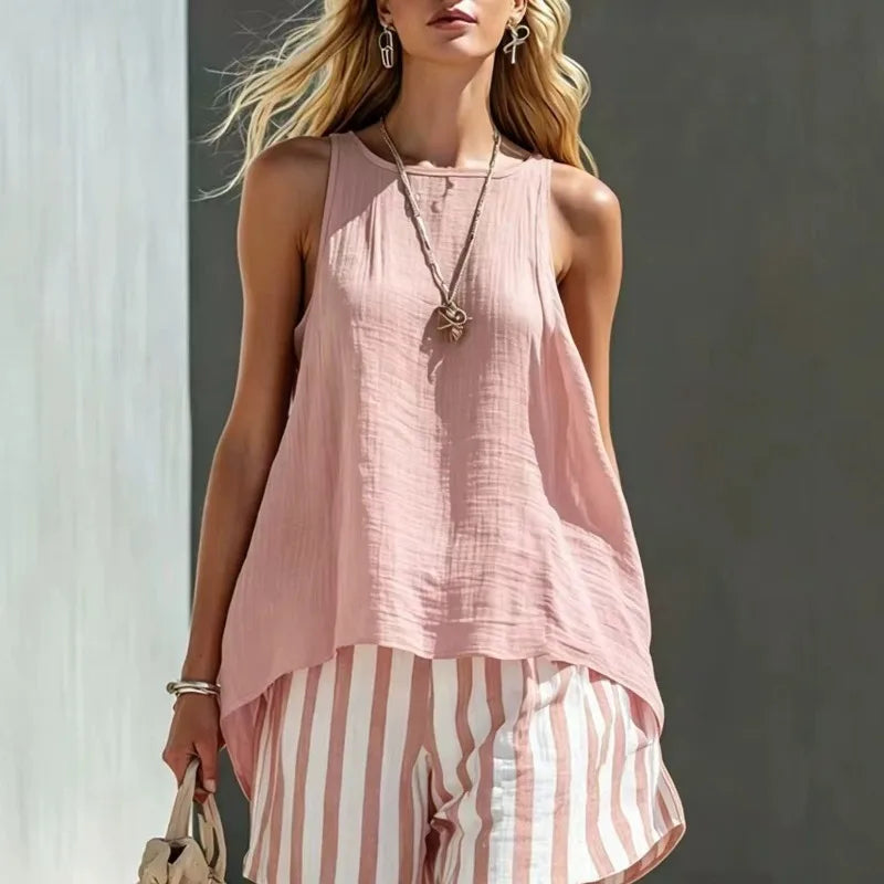 Comfortable women's sleeveless tank top and striped shorts set. Stylish two-piece for everyday, summer, or beach.