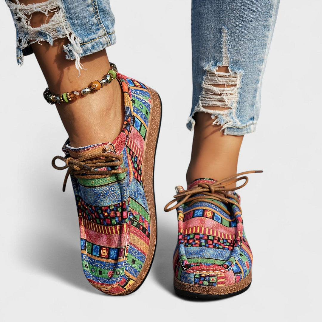 Women's casual sneakers providing stable support with a wide heel for all-day comfort and walking.