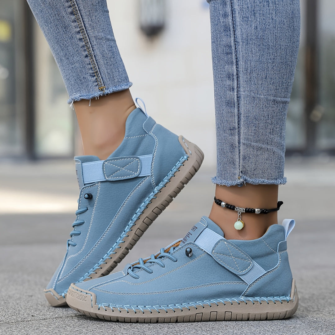 Comfortable women's walking shoes, designed with stitched accents & lace-up for casual, active everyday footwear.