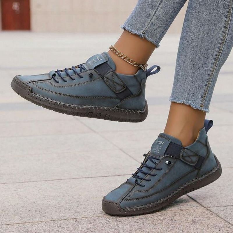 Women's everyday lace-up sneakers, featuring durable stitched details & comfortable fit for all-day casual wear.