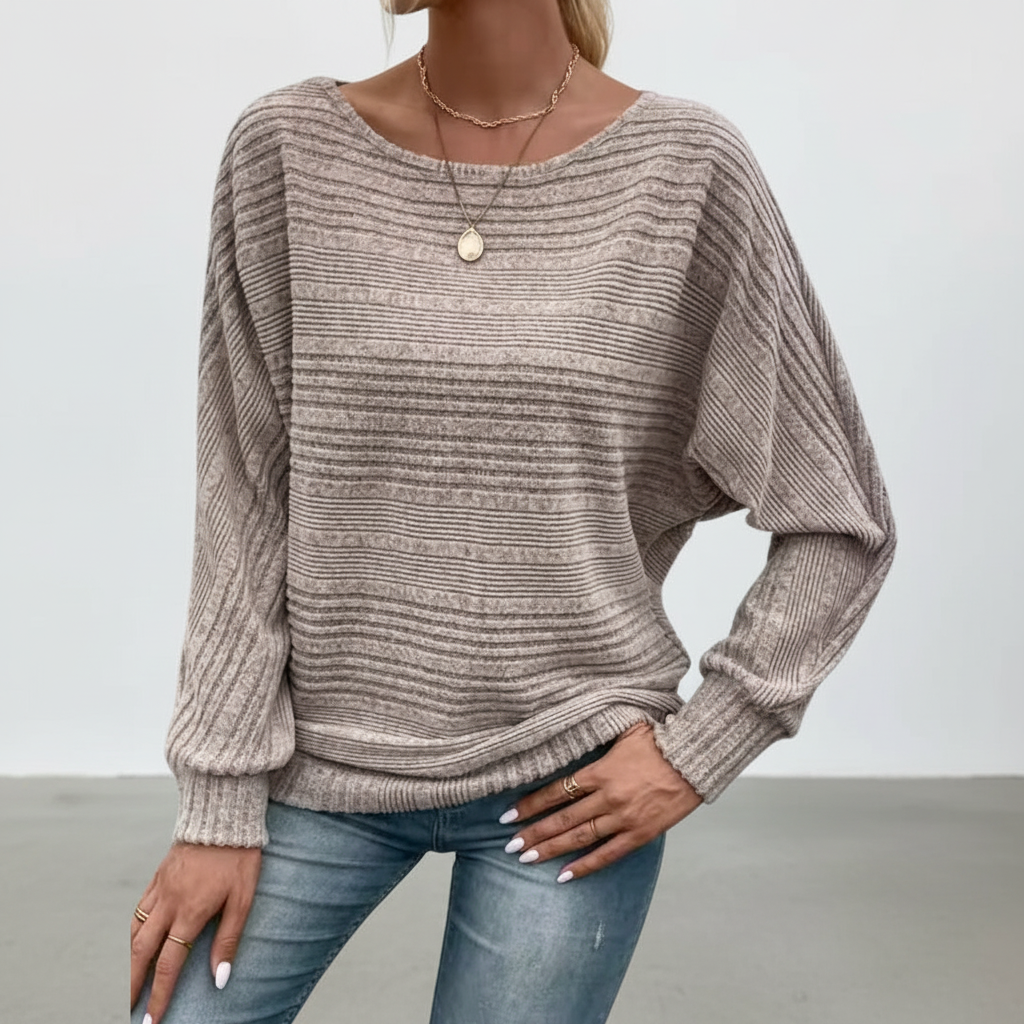 Comfortable women's striped knitwear with long sleeves, ideal for autumn and winter