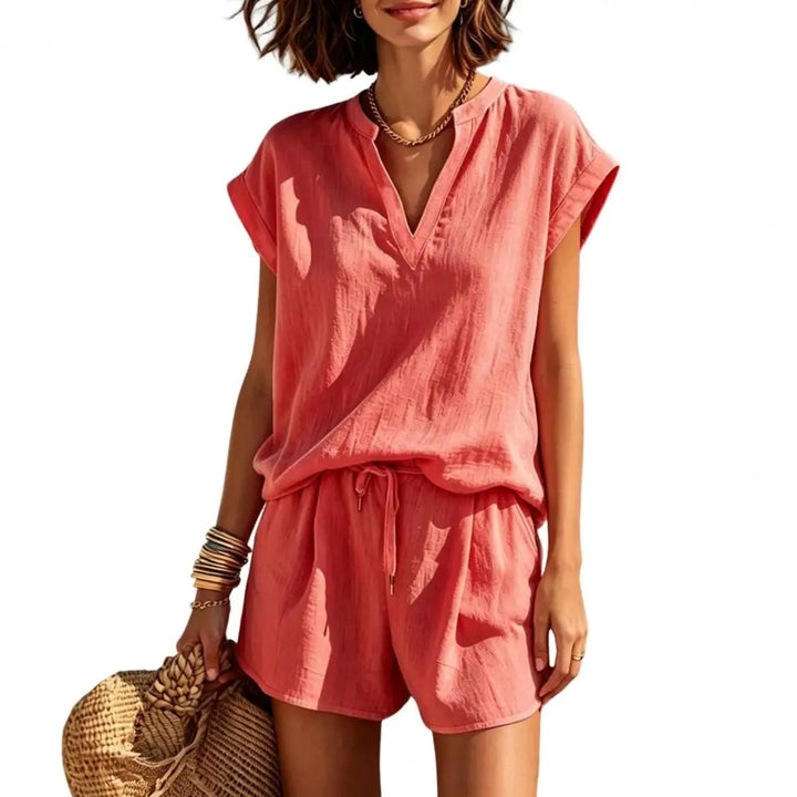 Women's casual summer matching set with a notch V-neck top and comfortable drawstring shorts, resort-ready.