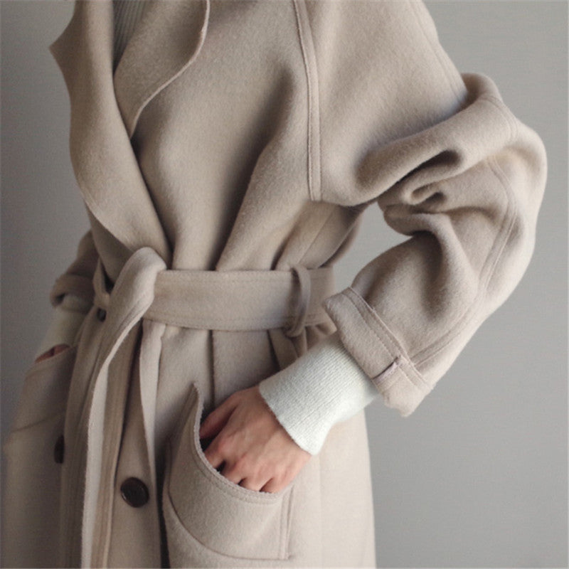Comfortable women's woolen long coat, perfect for casual fall and winter fashion.